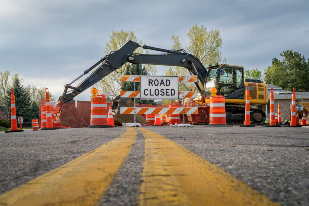 Road construction equipment and traffic barriers during a major street rehabilitation project in Lincoln, Nebraska.