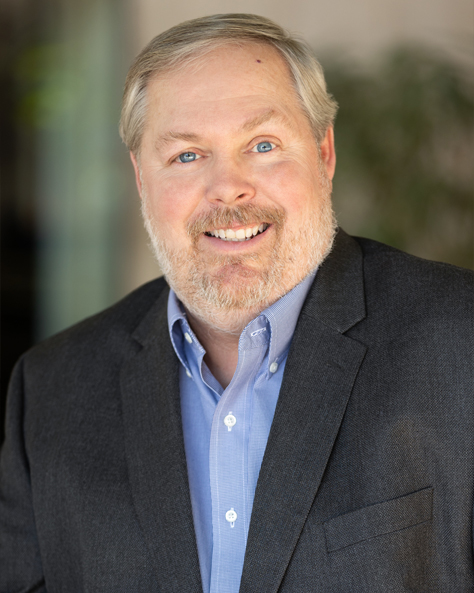 Portrait of Shawn Herzog, Senior Vice President of Facility Maintenance at NAI FMA Realty, in an office setting.