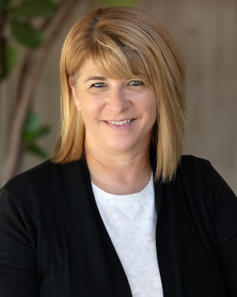 Portrait of Tammy Walter, Senior Property Manager at NAI FMA Realty, in an office setting.